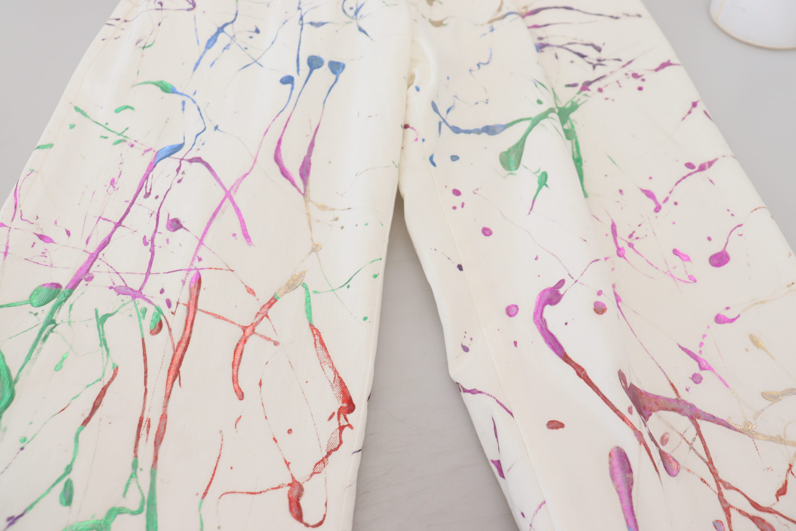 Dolce & Gabbana Chic White Splash Print Denim Pants